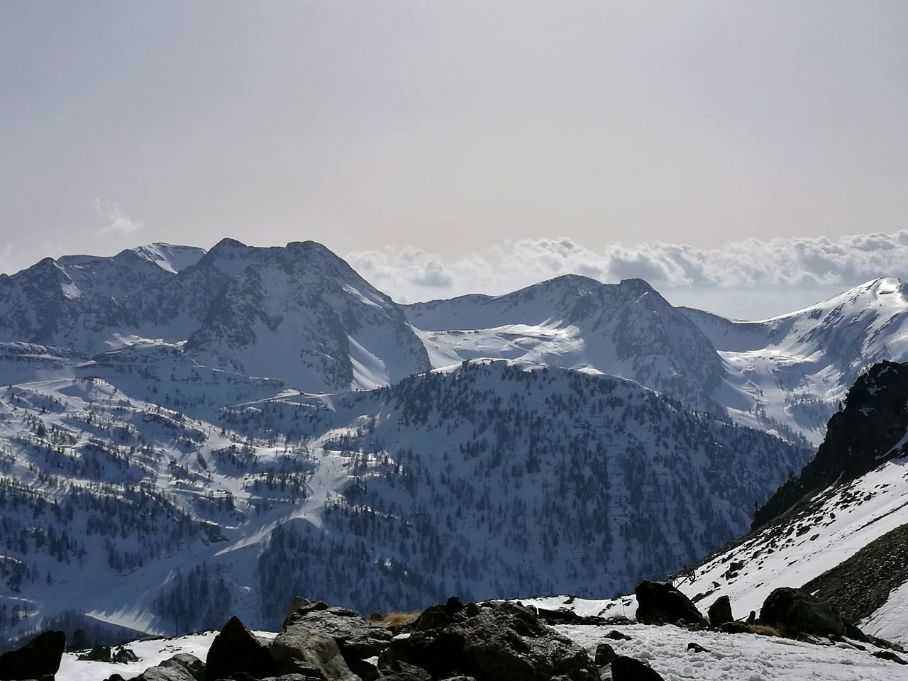 snow, mountain, mountain range, snowcapped mountain, landscape, cold temperature, mountain peak, pinaceae, winter, pine tree, tourism, scenics, beauty in nature, nature, travel destinations, outdoors, fog, no people, sky, day