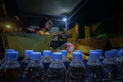 Man having food at night