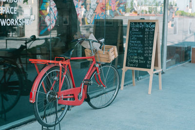 Bicycle parked on street in city