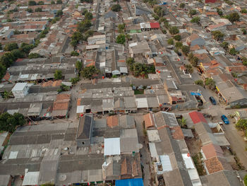 High angle view of street amidst buildings in city