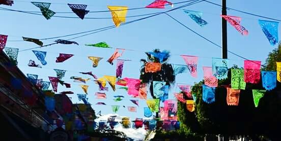 multi colored, art and craft, art, graffiti, creativity, hanging, colorful, wall - building feature, flag, variation, low angle view, street art, built structure, umbrella, architecture, decoration, human representation, text, painting, day