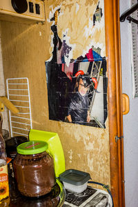 Midsection of man painting at home