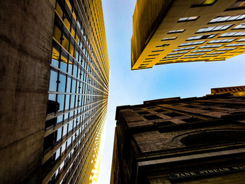 Low angle view of buildings against clear sky