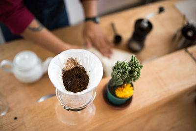 Close-up of coffee cup on table