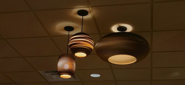 Low angle view of illuminated pendant light