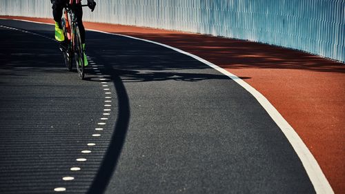 Cyclist cycling in track 