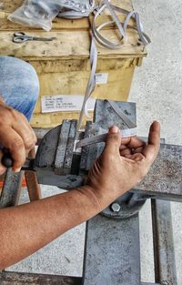 Cropped image of man working at workshop