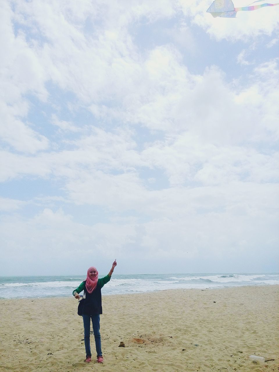 sea, beach, horizon over water, water, shore, leisure activity, lifestyles, sky, full length, childhood, sand, rear view, casual clothing, boys, standing, vacations, tranquility, tranquil scene