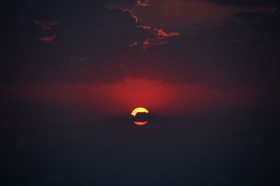 Scenic view of moon in sky at sunset