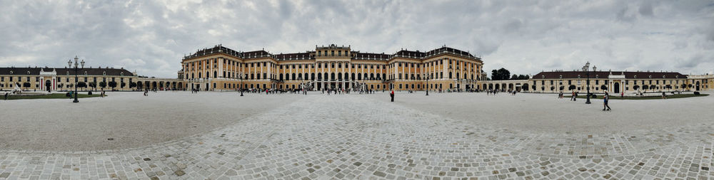 Panoramic view of historic building in city against sky