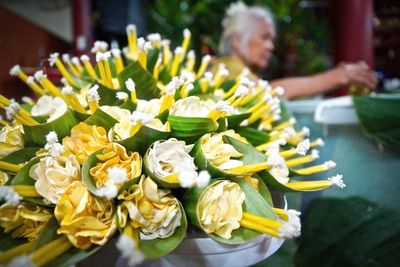 Flowers and candles wrapped in banana leaf for loi krathong festival 