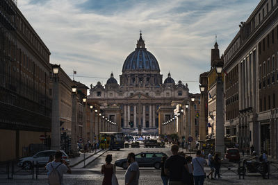 Group of people in front of buildings