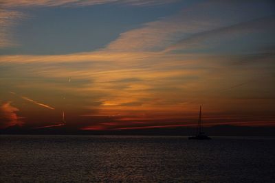 Scenic view of sea at sunset