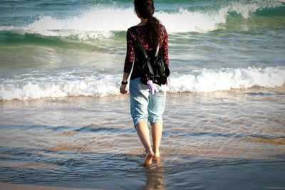 People standing on beach