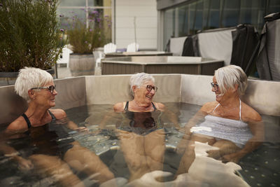 Senior women relaxing in hot tub