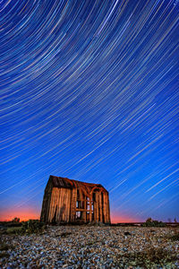 Lightning in abandoned house against sky