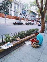 Man on street in city