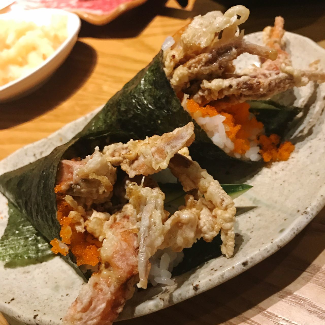 CLOSE-UP OF FOOD SERVED ON TABLE