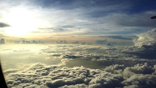 Sun shining through clouds