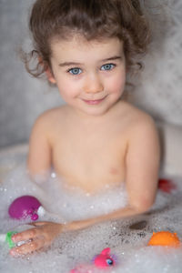 Portrait of cute girl in bathroom