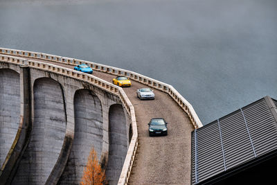 Low angle view of bridge over building against sky