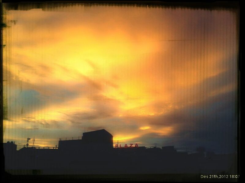 sunset, building exterior, silhouette, sky, architecture, transfer print, built structure, cloud - sky, auto post production filter, orange color, beauty in nature, cloud, scenics, cloudy, city, dusk, dramatic sky, nature, low angle view, building