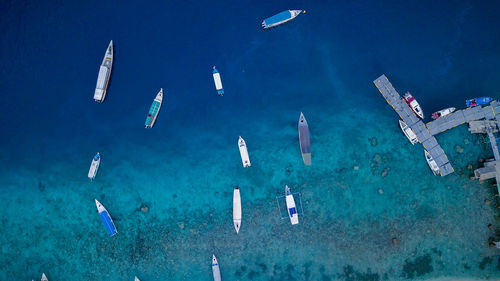 High angle view of sea against blue sky