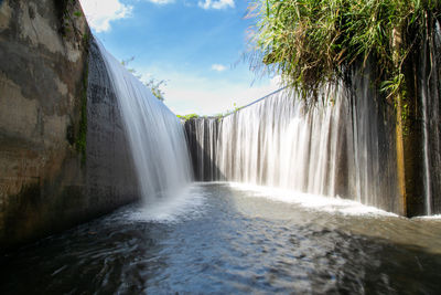 View of waterfall in forest