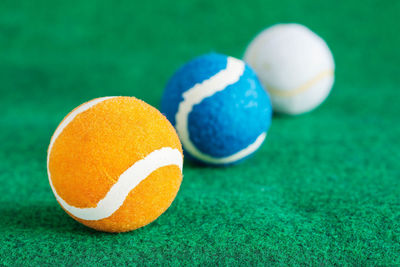 Close-up of blue and yellow balls