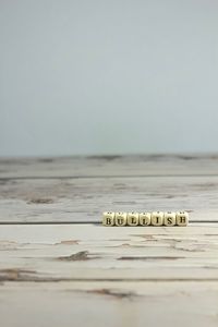 Close-up of coins on table