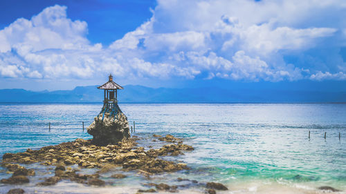 View of sea against cloudy sky