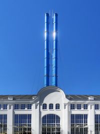 Low angle view of building against clear blue sky