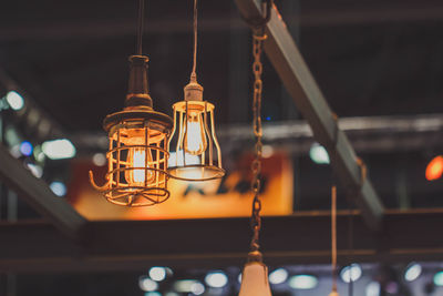 Low angle view of illuminated pendant light