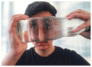 Portrait of man drinking glass