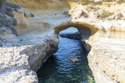 High angle view of rock formation in water