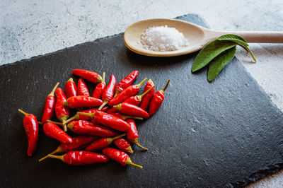 High angle view of red chili pepper on table