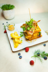 Close-up of food served on table