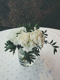 Close-up of white flowers on table