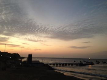 Scenic view of sea at sunset