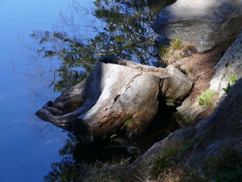 Low angle view of rock formation against sky