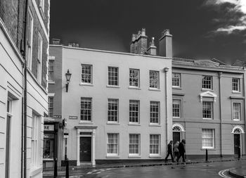 People in front of building