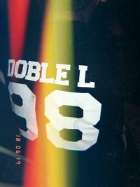 High angle view of text on glass