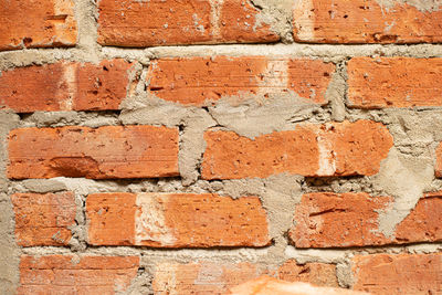 Brown brick wall in old architecture building texture.brick stone texture abstract background