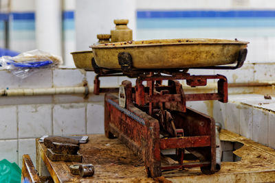 Close-up of damaged weight scale on table