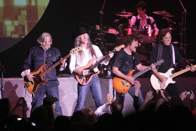 Group of people playing guitar