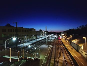 High angle view of railroad station at night