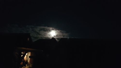 Low angle view of illuminated sky at night