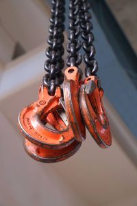 High angle view of chain hanging on metal