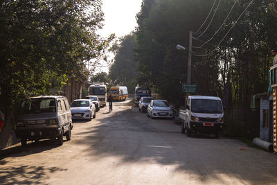 Cars parked on road in city