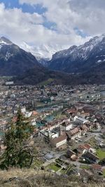 Aerial view of townscape and mountains